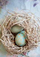 Floral ornamental eggs in nest