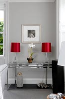 Modern console table with lamps 