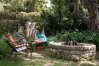 Garden fire pit with chairs 