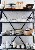 Kitchen shelves containing crockery 