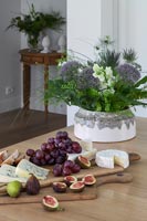 Fruits and flowers on wooden table