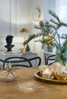 Christmas decorations on wooden dining table 