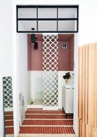 Decorative textured wall - screen to shower in modern bathroom 