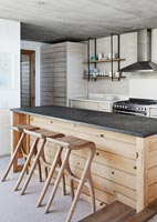 Modern kitchen with wooden island 