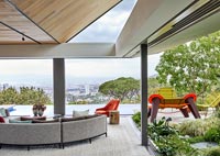 Contemporary living room with a retractable roof 