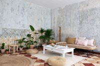 Country living room with bare plaster walls 