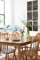 Wooden table and chairs in country kitchen-diner 