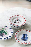 Colourfully hand painted side plates 