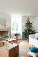 Modern living room with period features decorated for Christmas 