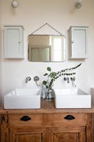 Double sinks in country bathroom 