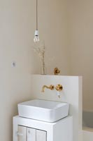 Bathroom sink with copper tap and faucet
