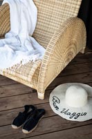 Wicker chair and throw 