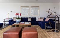 Blue corner sofa in modern living room 