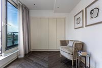 Fitted wardrobe and armchair