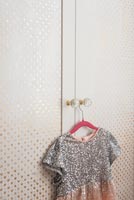 Childs dress on sparkly wardrobe doors 