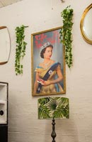 Colourful painting of the Queen and houseplants 