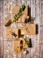 Christmas gifts on wooden table 