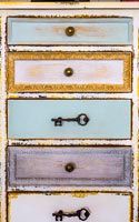 Chest of drawers with decorative handles 