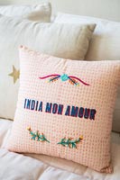 Pink cushion embroidered with 'India mon amour'