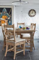 Wooden dining table in country dining room 