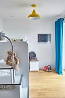 Modern childrens room with bunk beds 