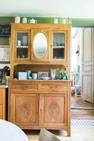 Wooden dresser in country kitchen-diner 