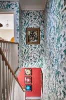 Wallpapered staircase walls and landing 