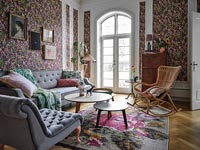 Colourful floral wallpaper in modern living room 