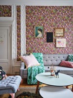 Colourful floral wallpaper in modern living room 