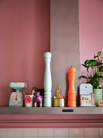 Pink painted walls in modern kitchen 
