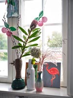 Vases on windowsill 