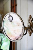 Wall mounted vintage magnifying mirror 