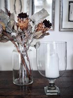 Modern candle and dried flowers 