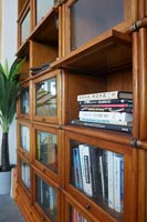 Bookshelves with individual closing windows 