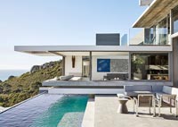 Modern patio with infinity swimming pool