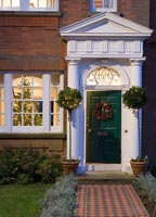 Edwardian house entrance decorated for Christmas 