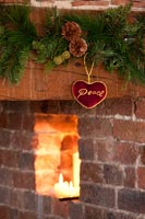 Traditional fireplace decorated for Christmas 