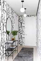 Black and white wallpaper in the hallway