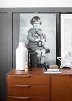 Retro sideboard with portraits 