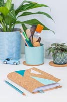 Cork covered notebook with geometric painted shapes