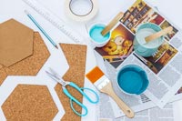 Tools and materials for creating hexagonal wall hangings from sheet of cork