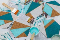 Hexagonal cork shapes with painted geometric shapes