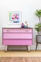Finished set of drawers painted dusty pink with drawers in different shades - ombre paint effect.