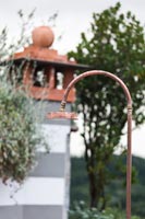 Outdoor copper shower on balcony