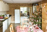Modern kitchen diner decorated for Christmas 
