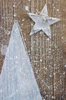 Close up detail of painted star on decorated wooden board