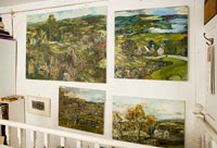Collection of paintings on wall 