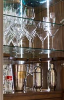 Glasses displayed in cabinet 