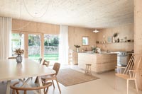Modern timber clad open plan kitchen-diner