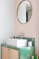 Green and pale pink bathroom 